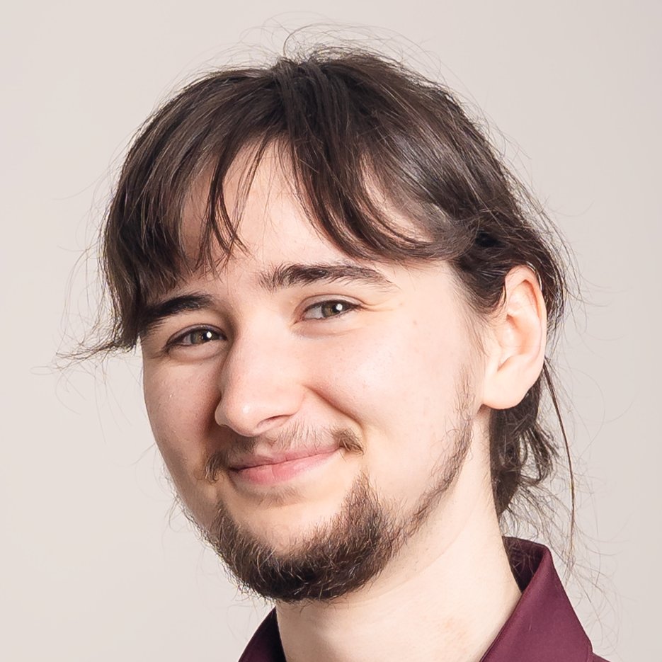 Neutral headshot smiling at the camera